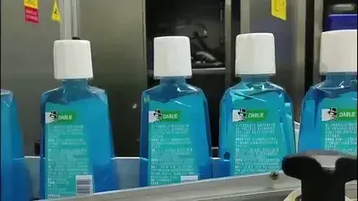Tamper-Evident Band Applicator & Shrink Tunnel for Mouthwash Bottle Neck Banding